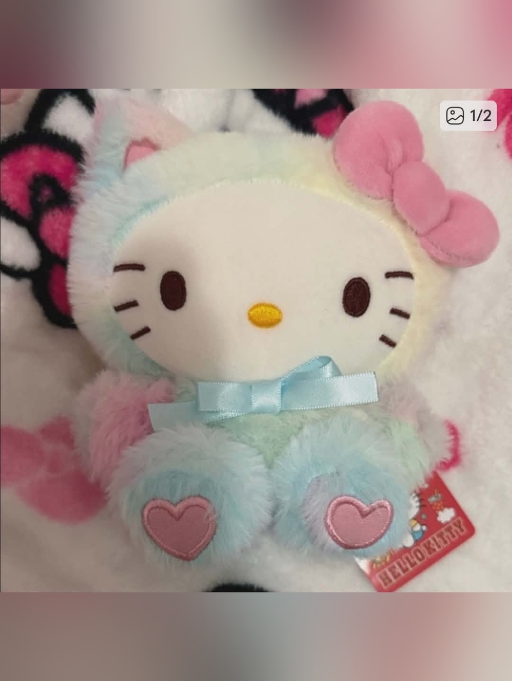 Hello Kitty Pastel Rainbow Plush with Pink Bow and Blue Ribbon Accent